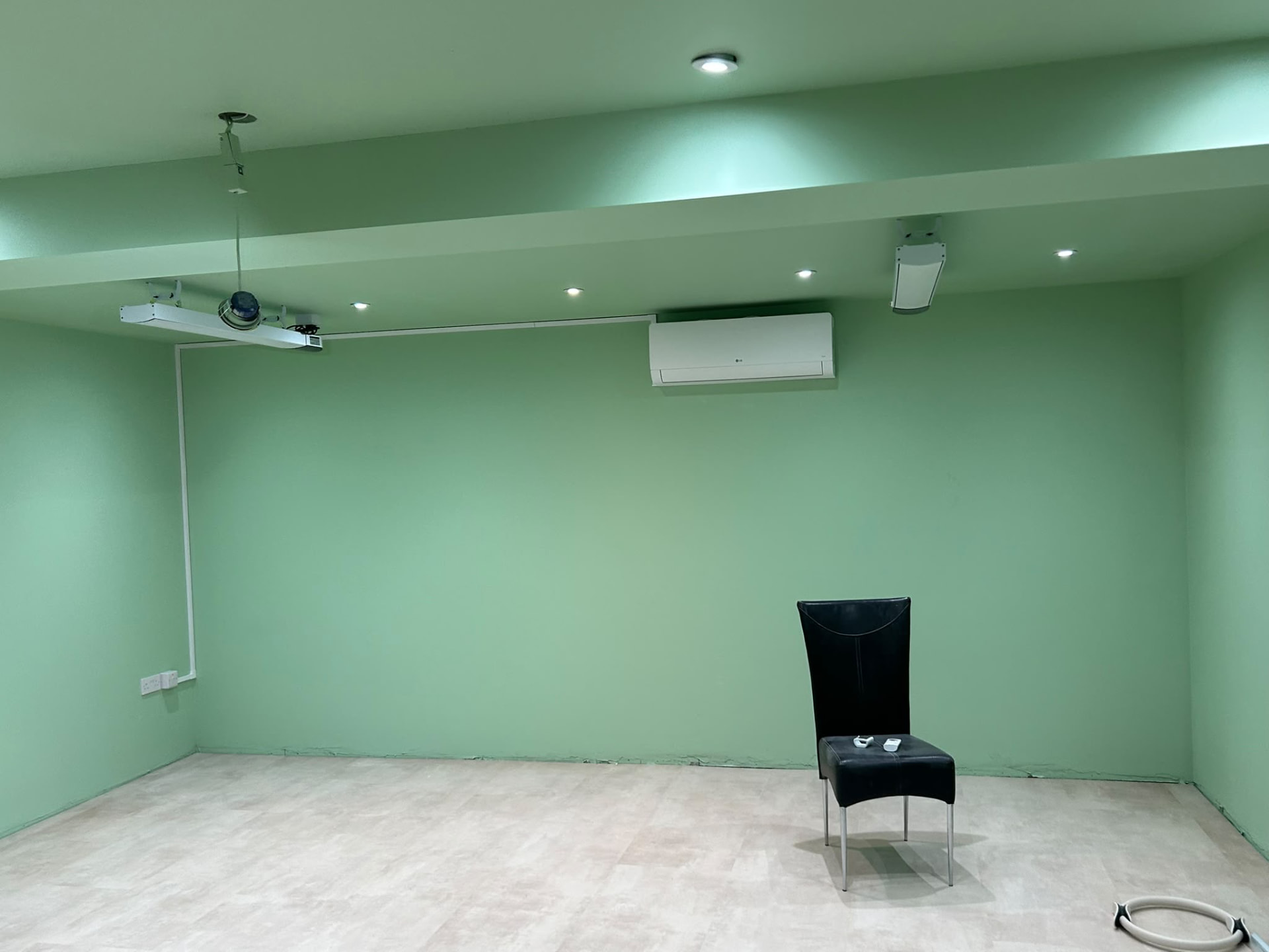 LG wall-mounted air conditioner installed in a large residential studio